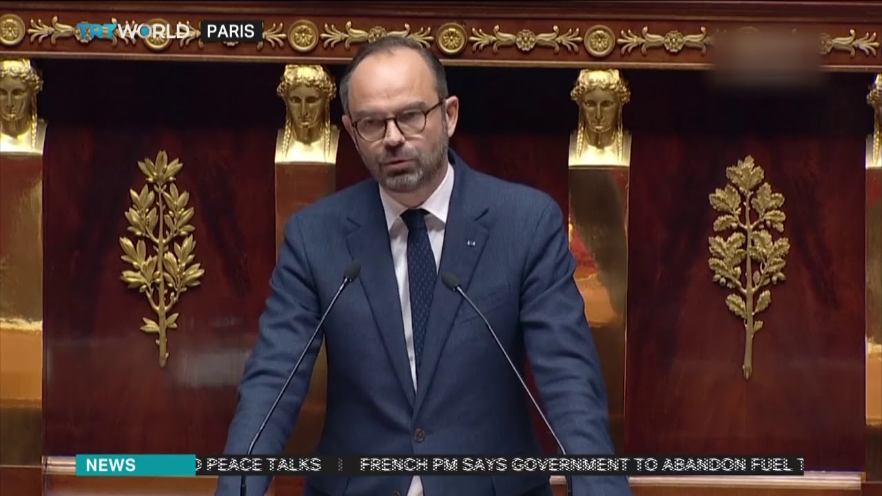 France abandons fuel tax rises amid deadly protests