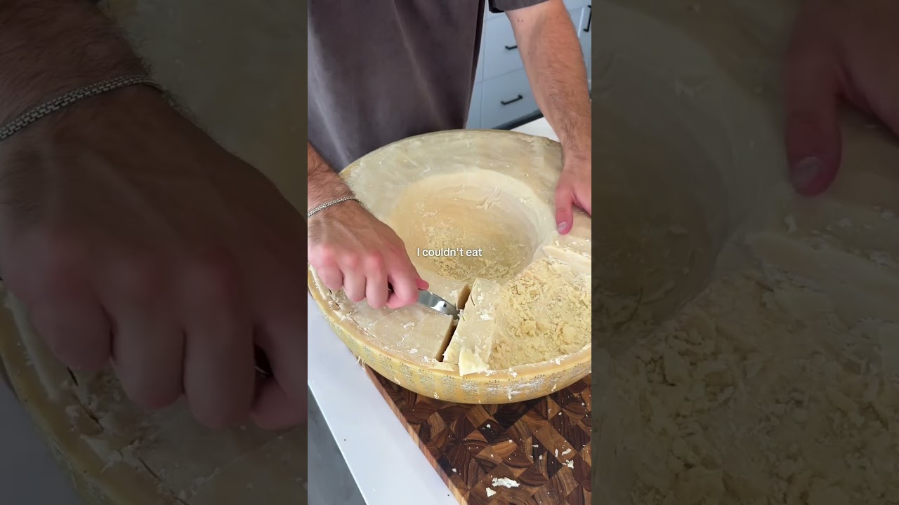 Cutting up the cheese wheel