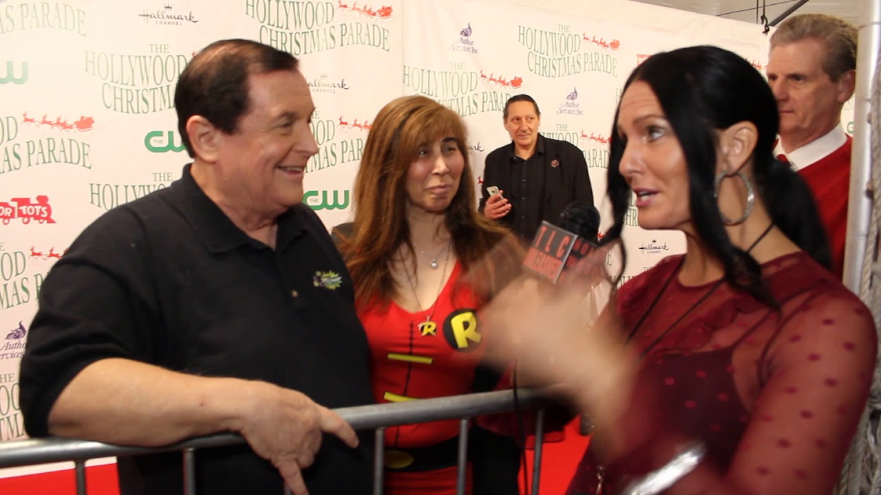 Traci Lynn Cowan with Burt Ward and his wife Tracy at Hollywood Xmas Parade.
