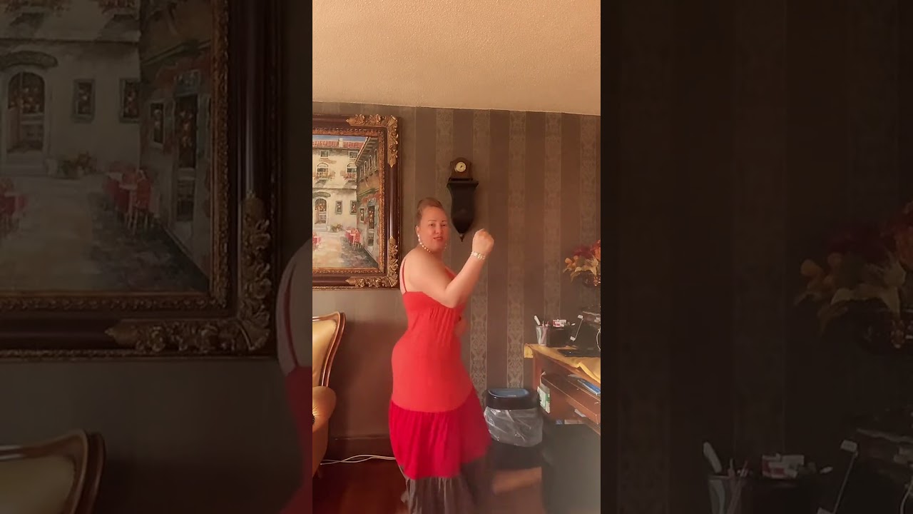 Woman Grooves to Latin Music at Home#dance #latinmusic #woman #dancingathome