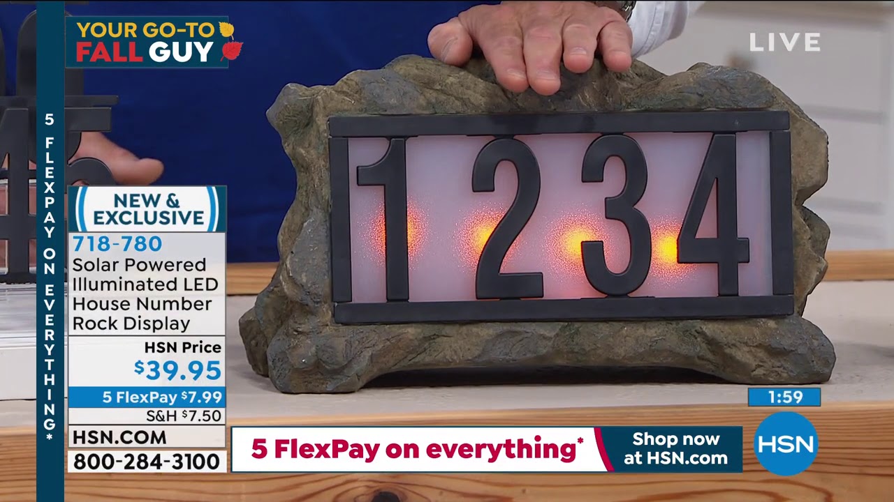 Display a forma di roccia con numero civico illuminato a LED ad energia solare