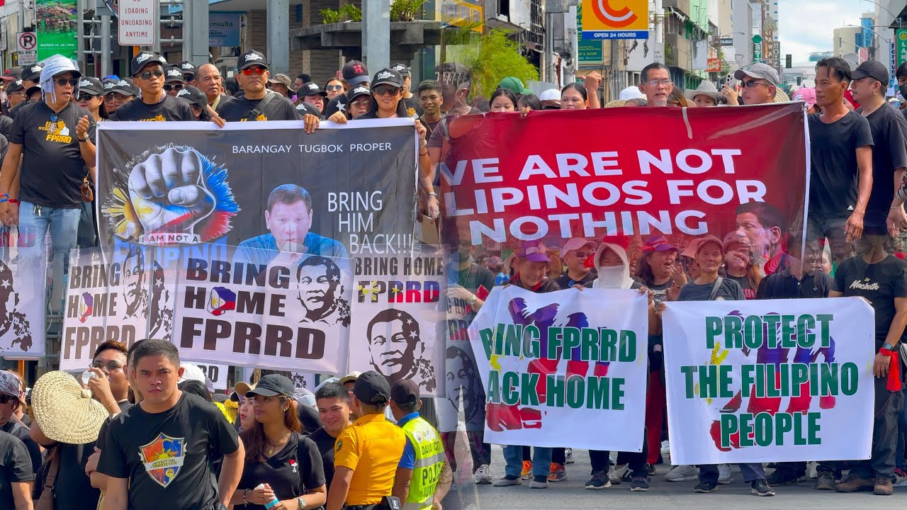 BUMAHA NG ITIM NA DAMIT AT PULANG RIBBON SA KALSADA NG DAVAO CITY!