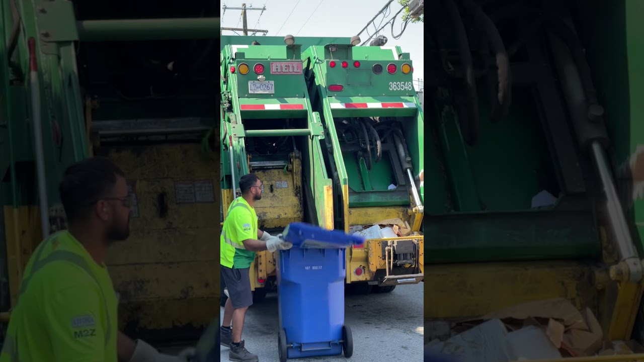 Rear Loader Heil Garbage Truck with Dual Compactors Collects Recycling in Machine Town