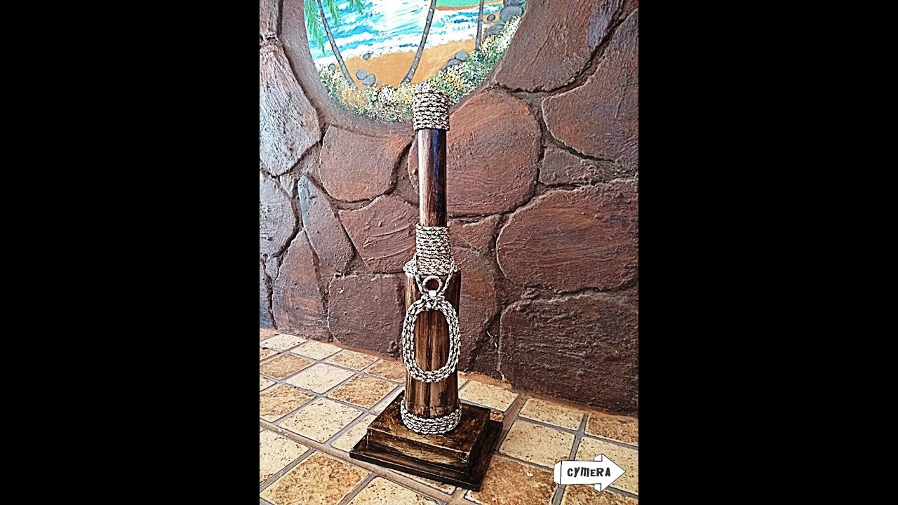Garrafa Alongada decorada com Corda de Varal e Betume.