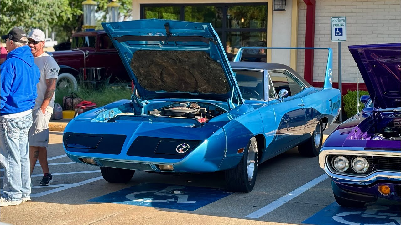 Classic Cars Leaving Mustang Sally Productions Car Show at Fords Garage Plano TX