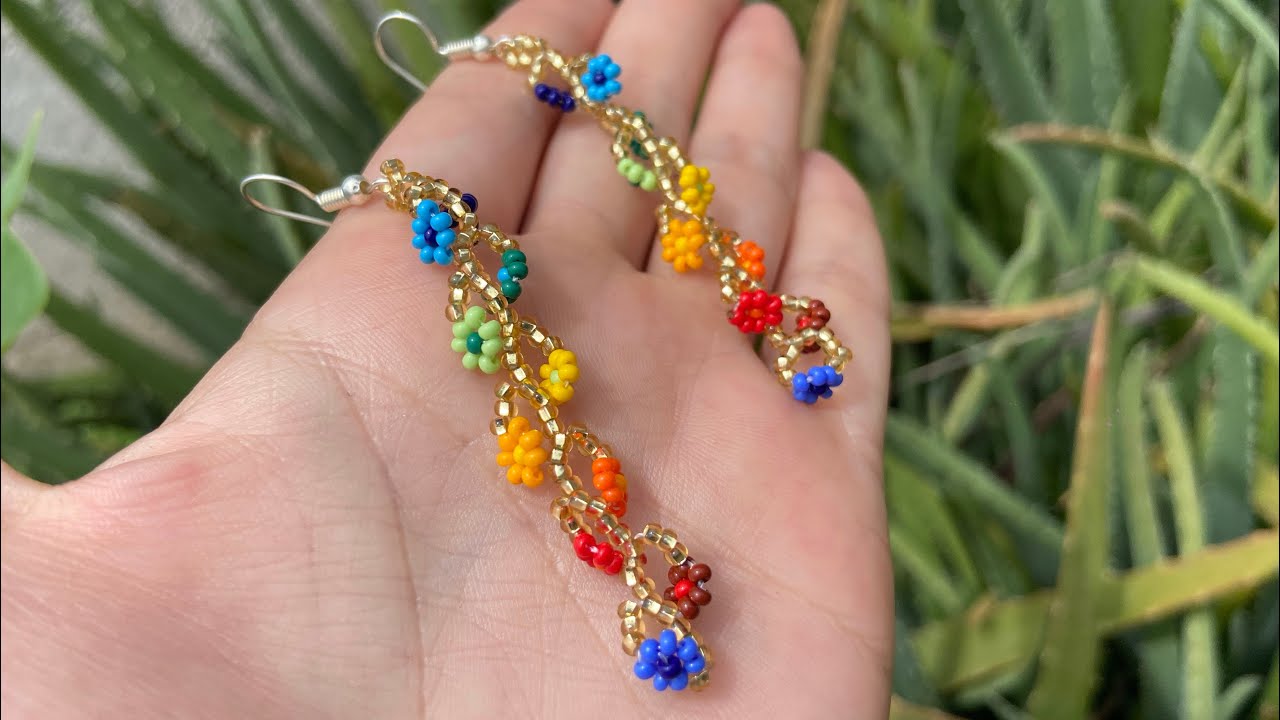 Aretes de florecitas en mostacilla 💙🤎❤️🧡💛💚