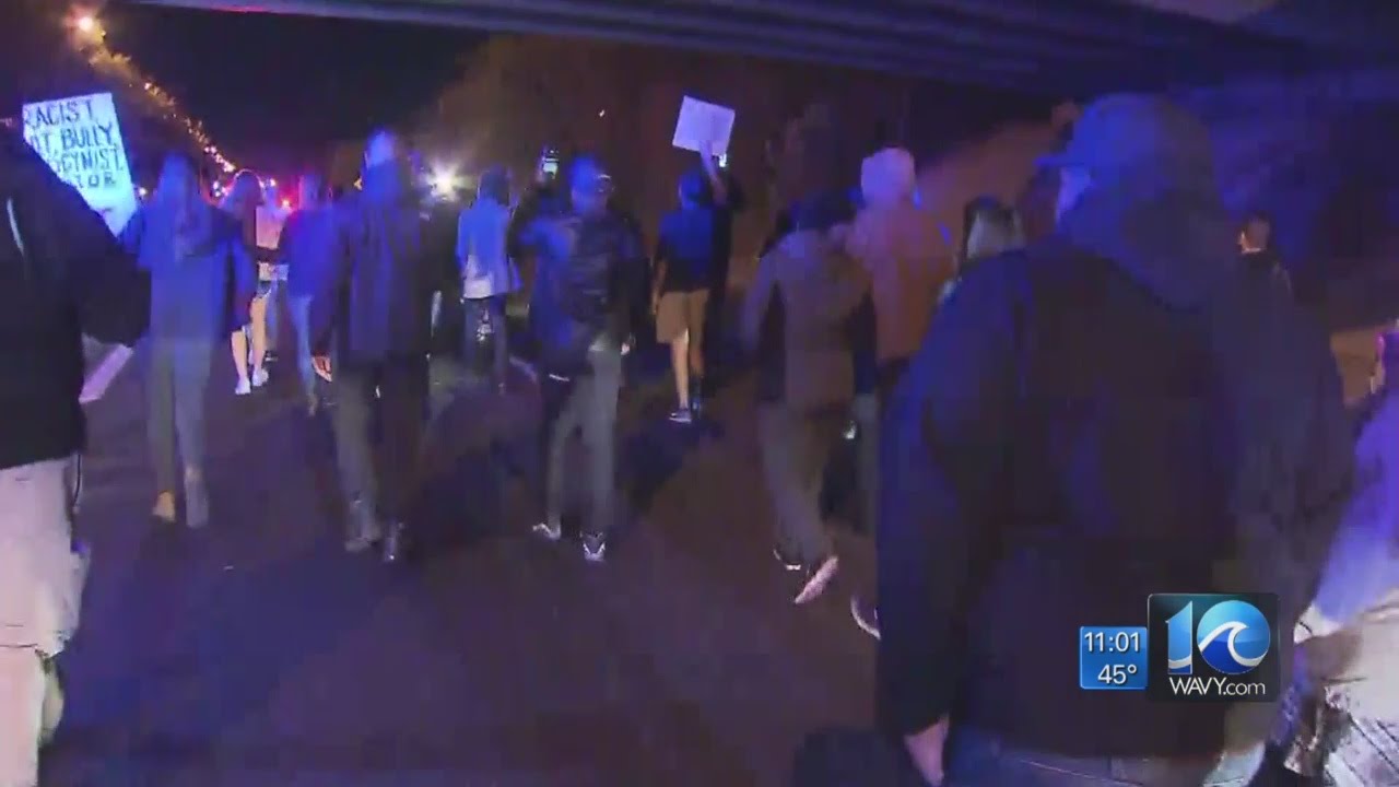 Demonstrators in Hampton protest the Electoral College, Trump