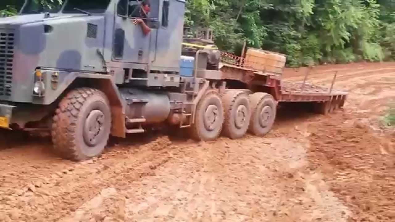 Climbing the slippery mountain with the Oshkosh M1070 in worse conditions
