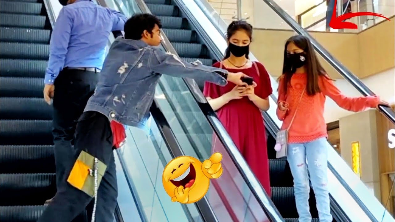 PHONE SNATCHING 😂PRANK  ON ESCALATOR | EPIC REACTION