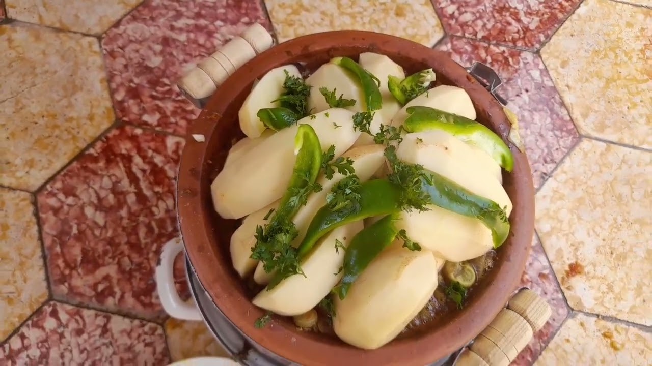 هدا هو نهار ديالي معاكم فسطح درنا طاجن على المجمر وتغدينا