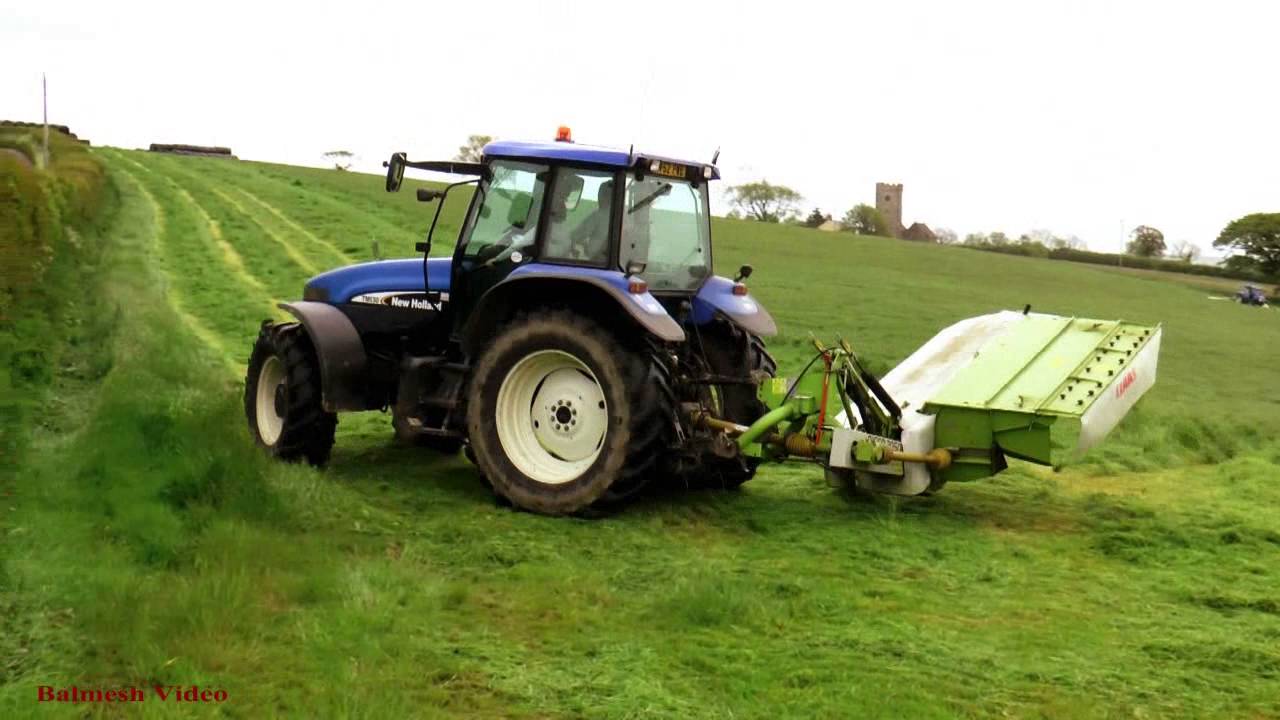 Mowing for Silage.  Three Tractors, Six Mowers.