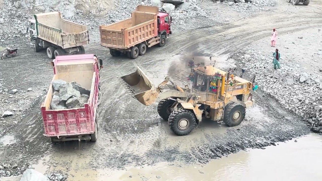 CAT 966D Loader Loading Giant Rocks into Dump Trucks | Extreme Quarry Operations