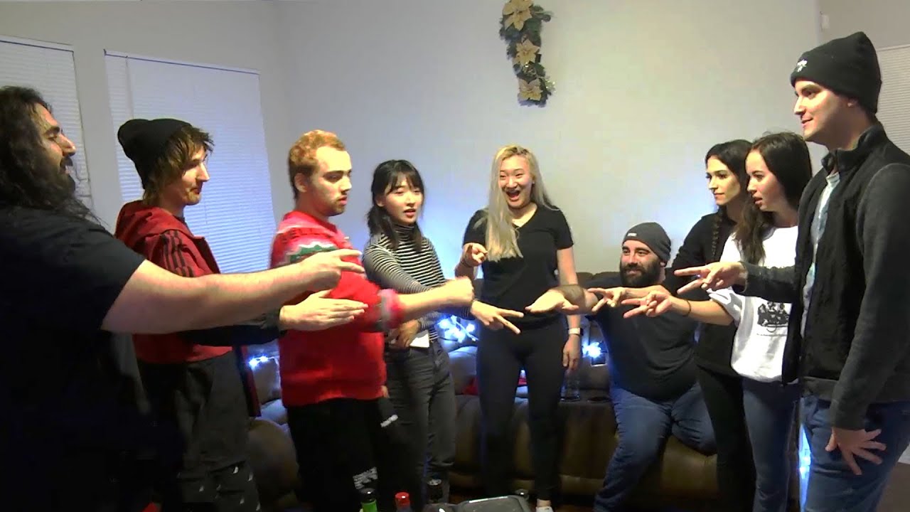 OTK and Friends Exchange Gifts at Esfand's Christmas Party