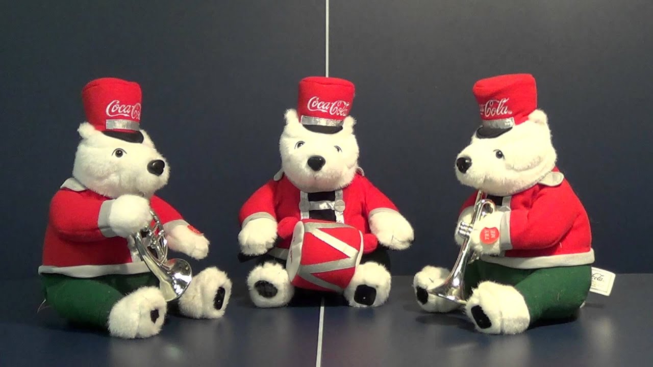 3 little Coca Cola bears play in a band together