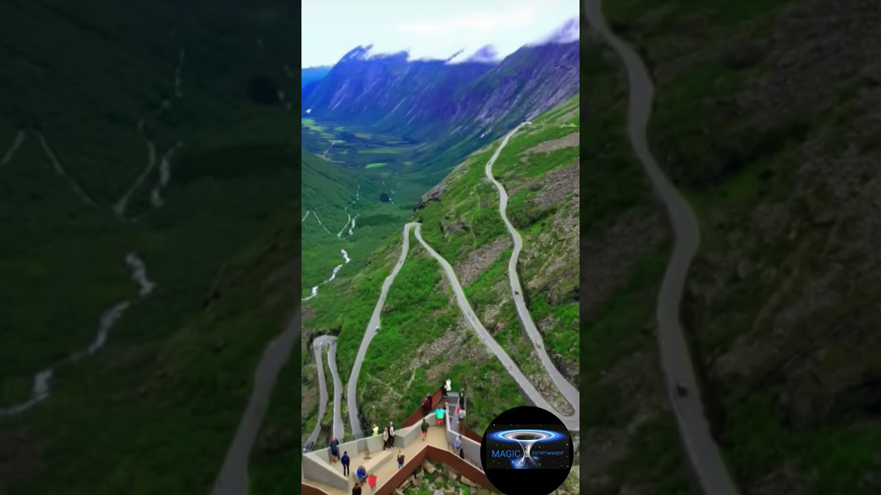   Famous Trollstigen (Troll's Path) serpentine mountain road and Stigfossen waterfall in Norway. 