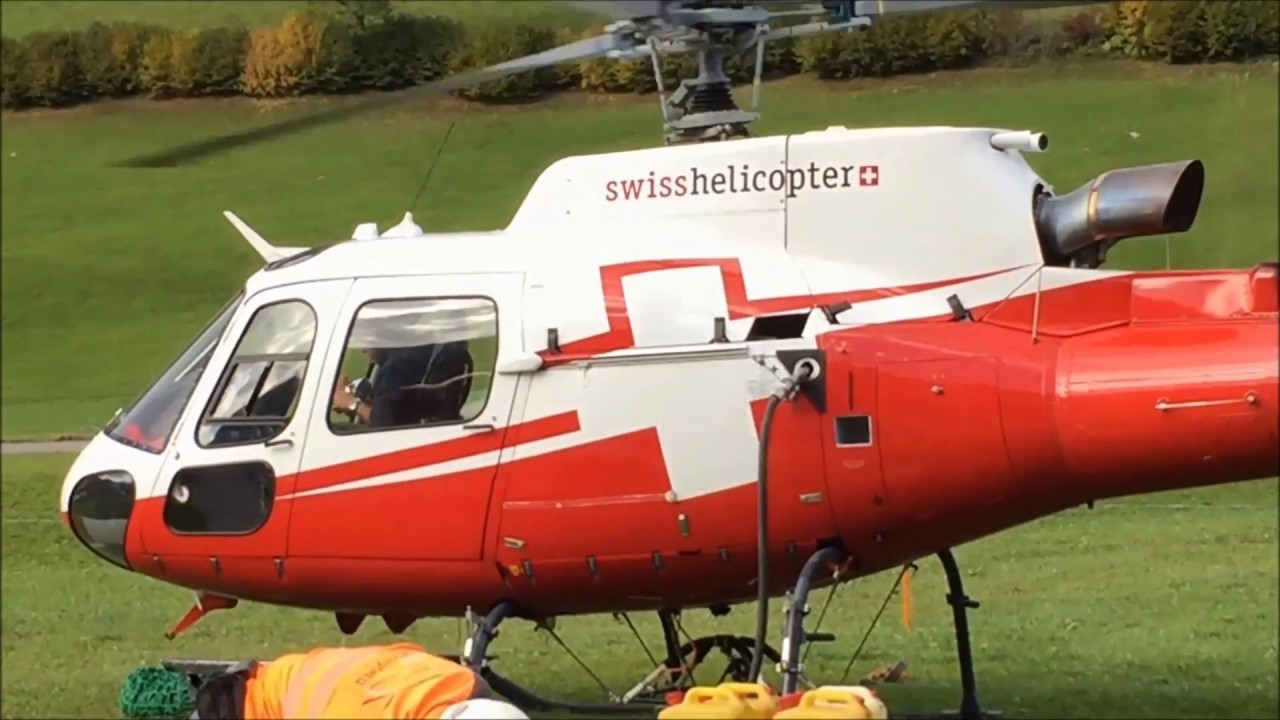 HELICOPTER LOGGING SNOW COUPLES BERGBAHNEN SWISS EC AS 350 ECUREUIL REFUEL WILDHAUS | SWISSPOWERJET