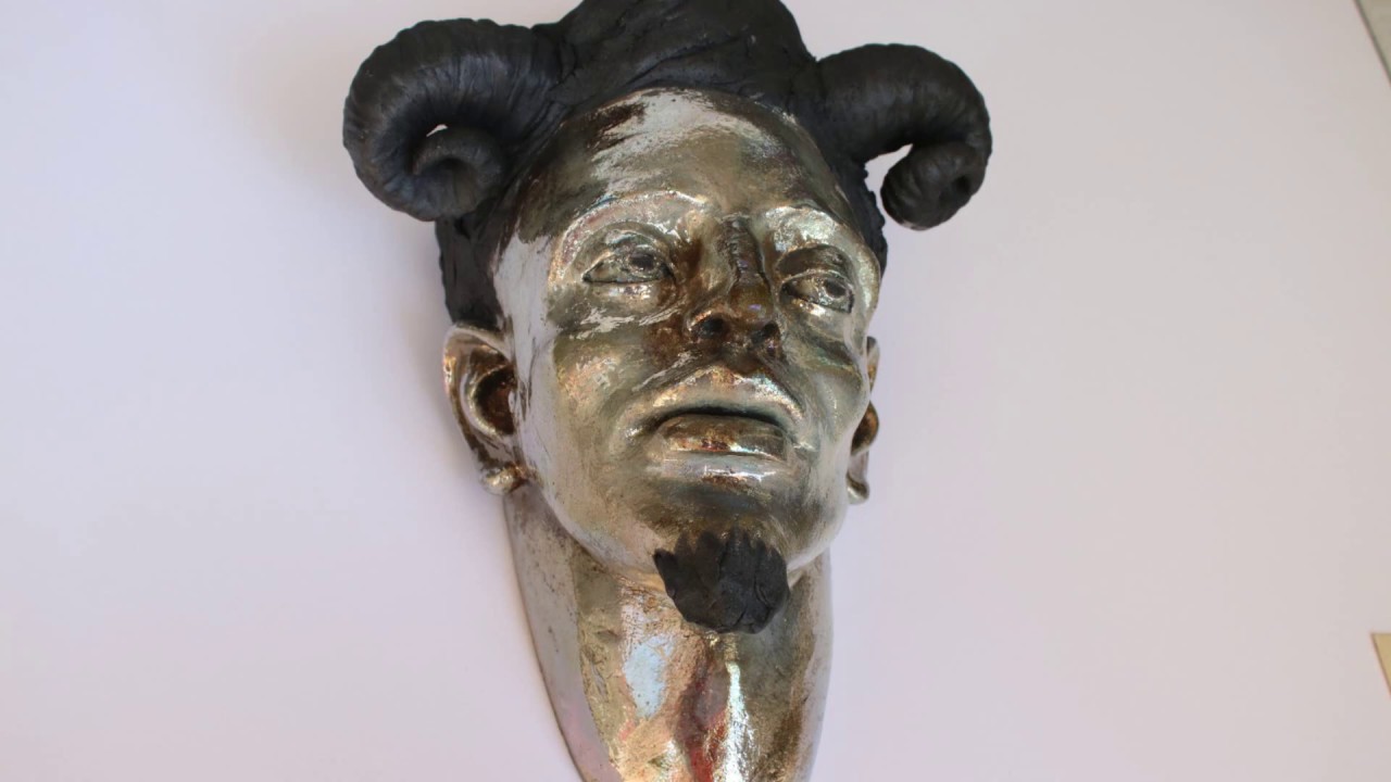 Raku Ceramic Sculpture face fire