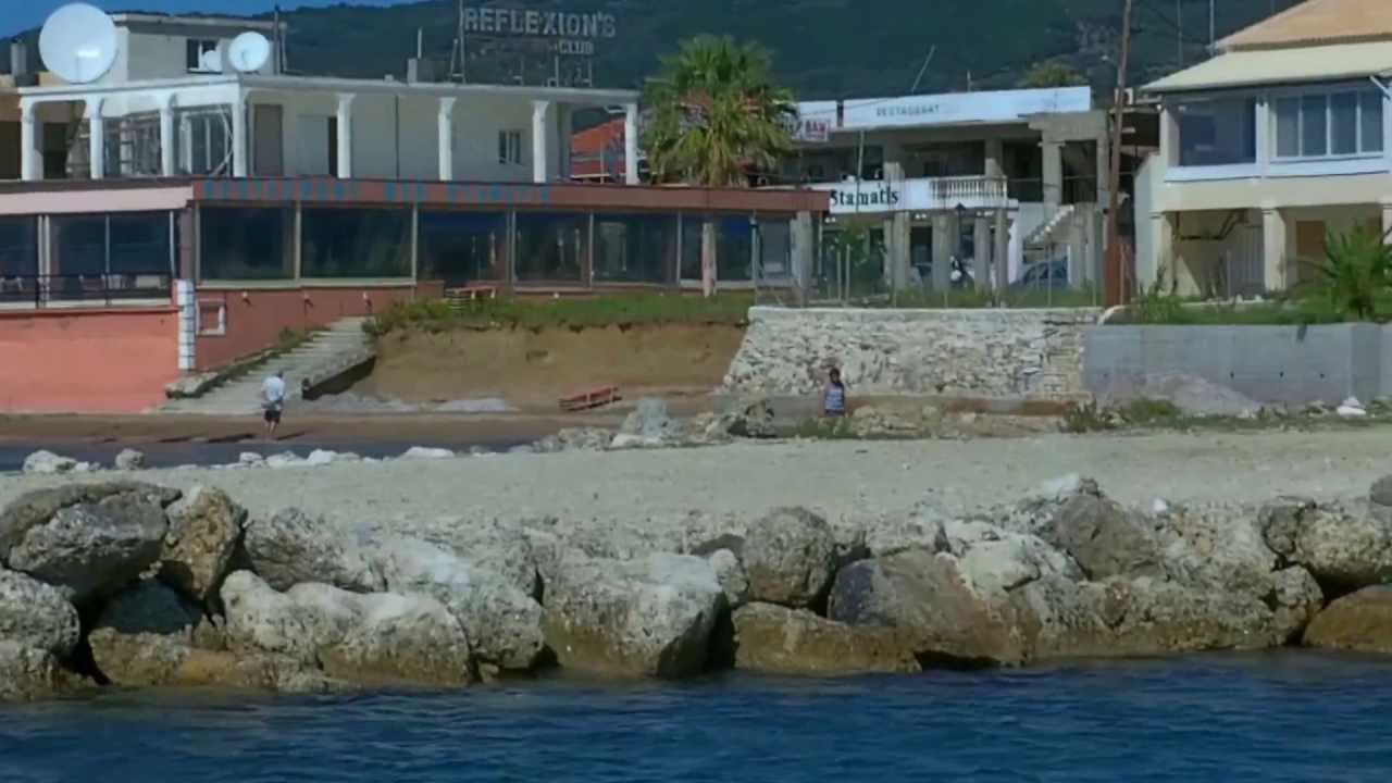 Greece, St George South Corfu Harbour, along main street and Spiros on the Beach Restuarant