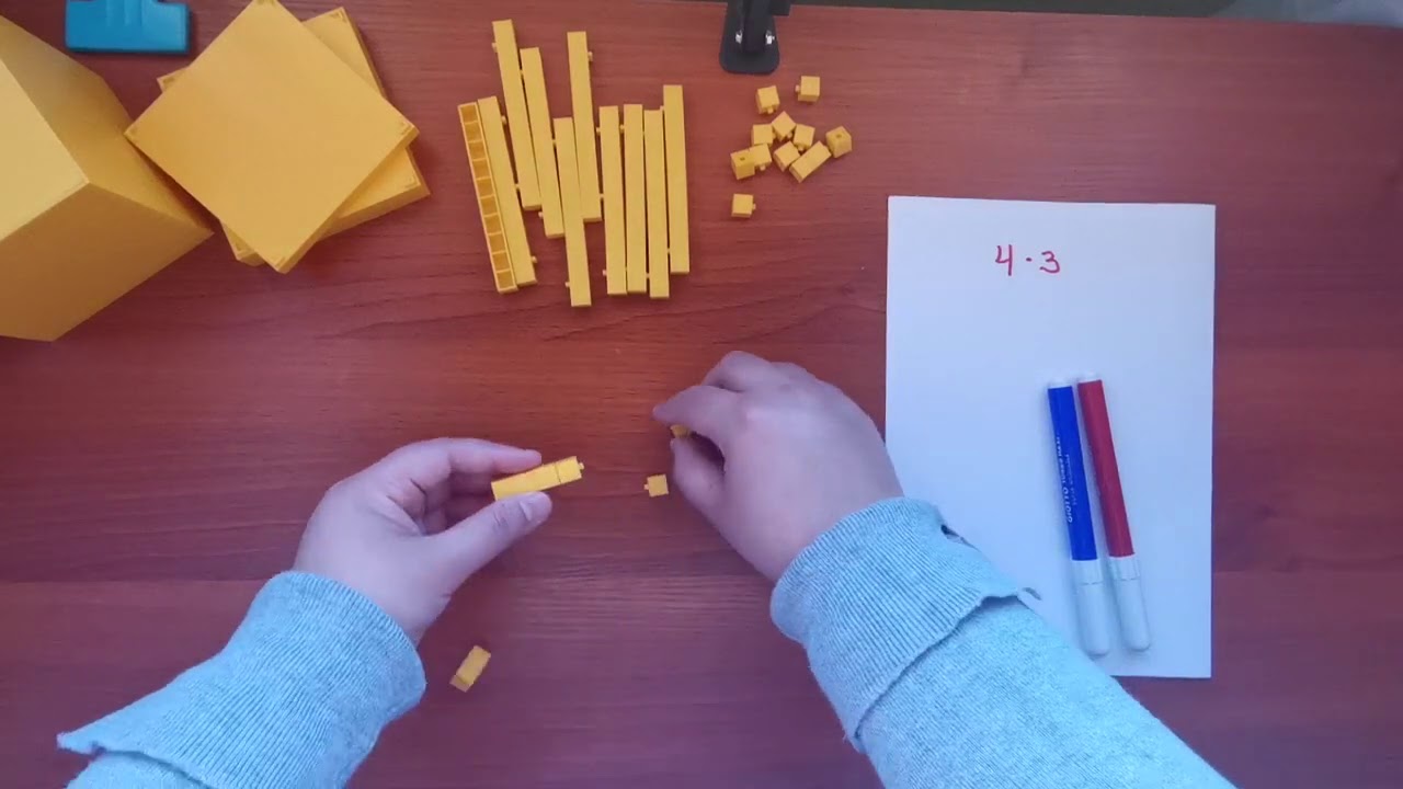 Los bloques base 10 y representar multiplicaciones