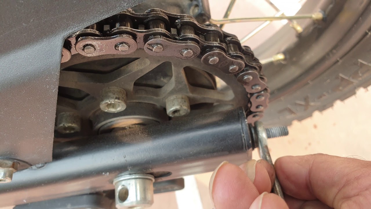 Royan Enfield Himalayan - How do adjust Chain | Chain Slack adjustment for smoother gear shifts