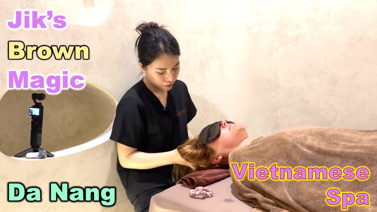 Vietnamese beauty massaging European lady.