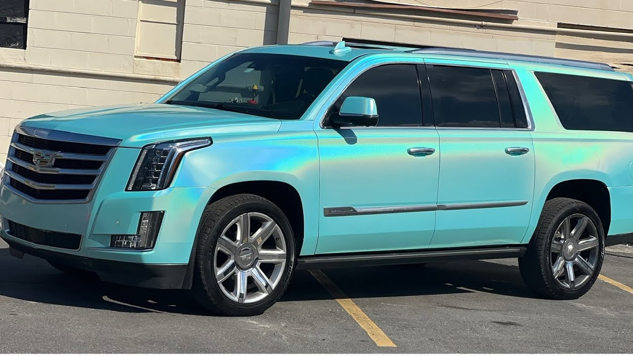 Psychedelic vinyl wrapped Cadillac Escalade