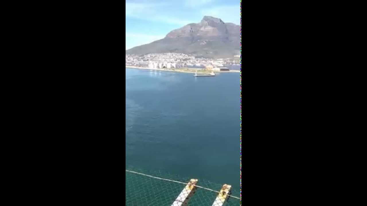 Handeling the Oil Rig into HARBOUR using 5 tugs...