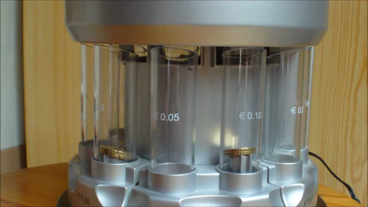 Coin sorter coin counter in use / M&uuml;nzz&auml;hler Geldz&auml;hlmaschine in Betrieb