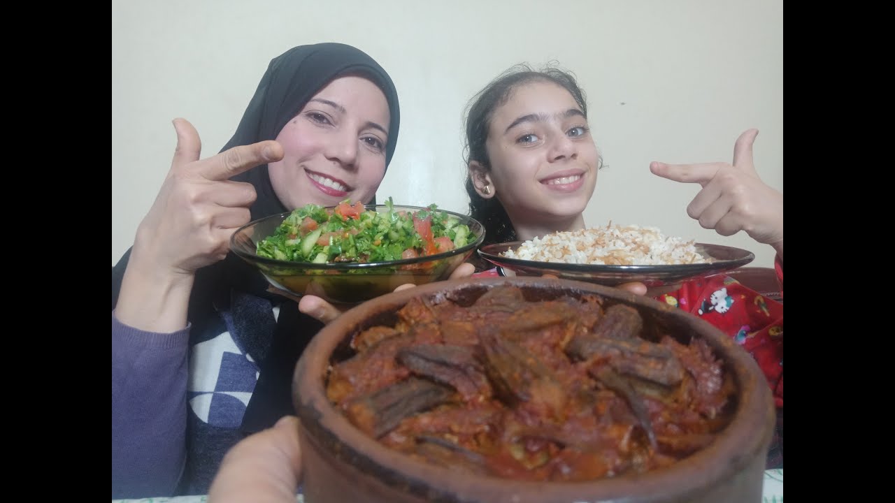 تحدي امال ورضوي ضد قناه عائله احمد و امال على طاجن باميه باللحمه الضاني و ملوخيه ورز