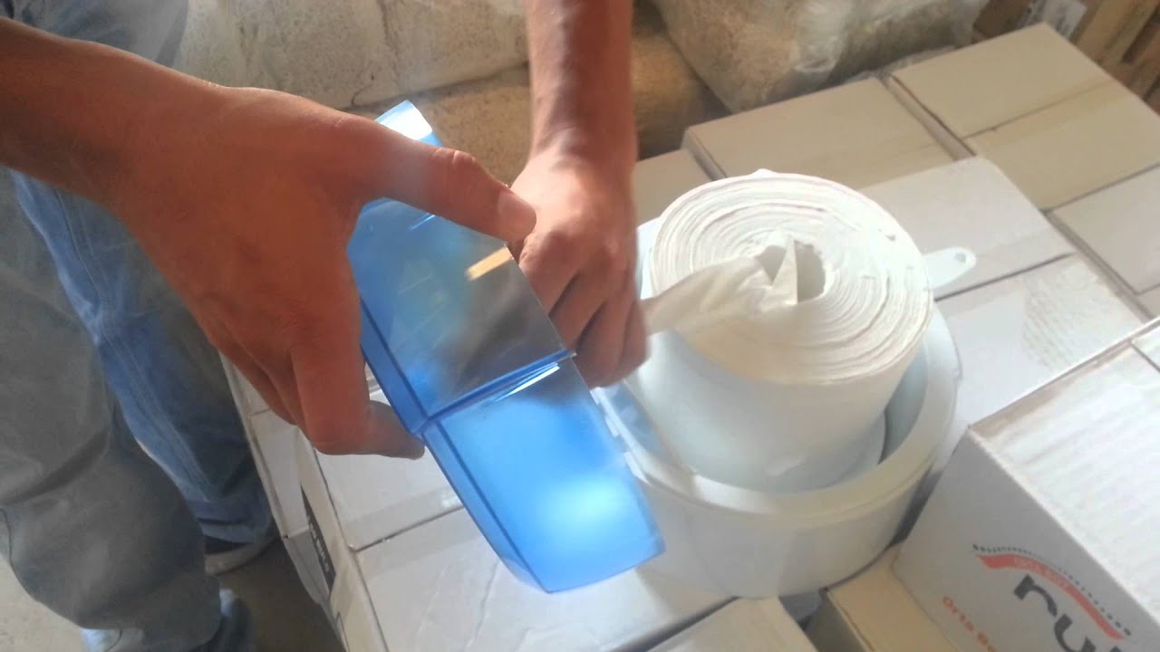 İçten çekmeli tuvalet kağıdı aparatına yerleştirme.