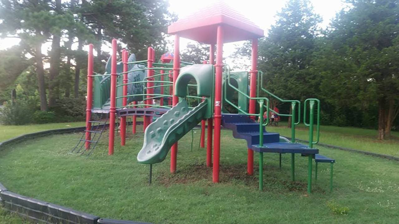 Razors embedded in playground slides