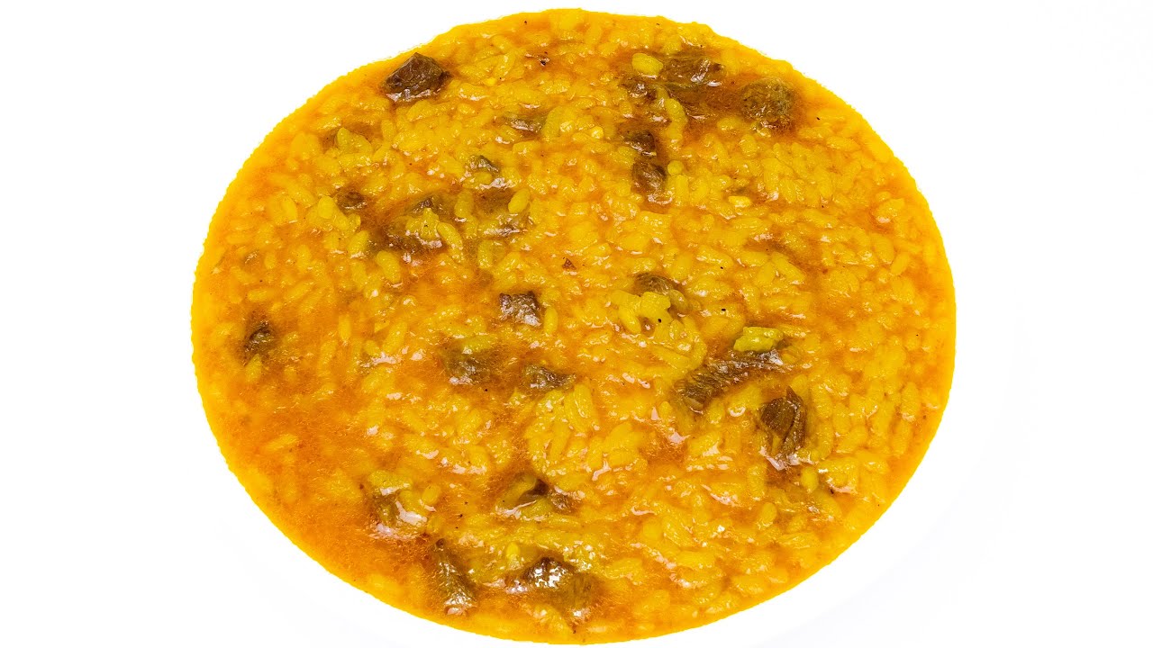 Arroz caldoso con abanico Ibérico