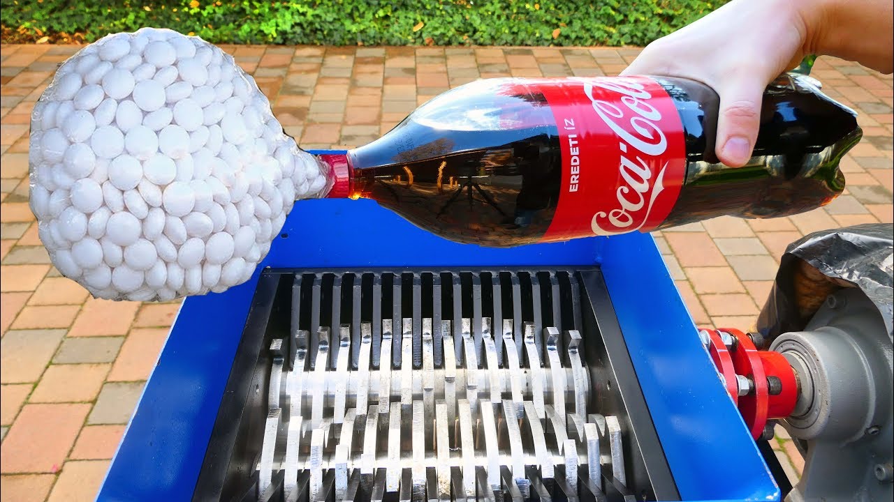 WHAT HAPPENS IF YOU DROP MENTOS & COCA COLA INTO THE SHREDDING MACHINE?