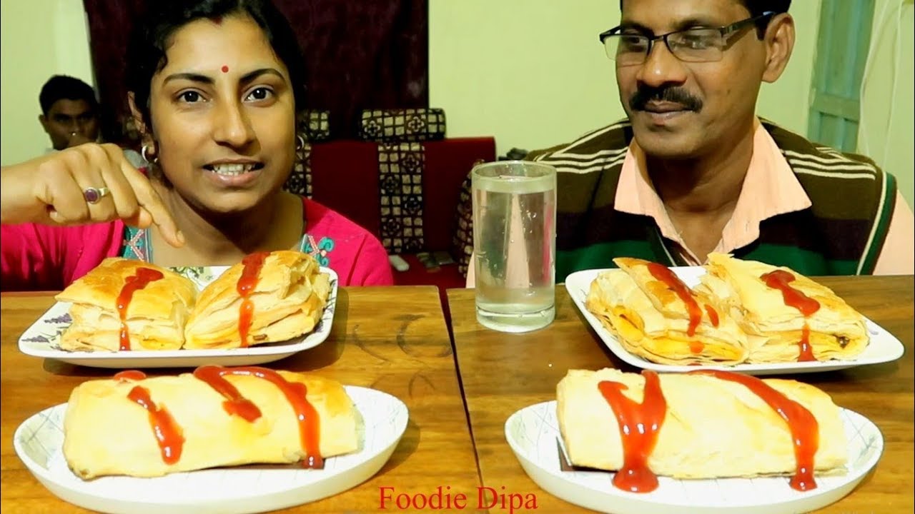 Eating Chicken Patties, Chicken Roll - Foodie Dipa