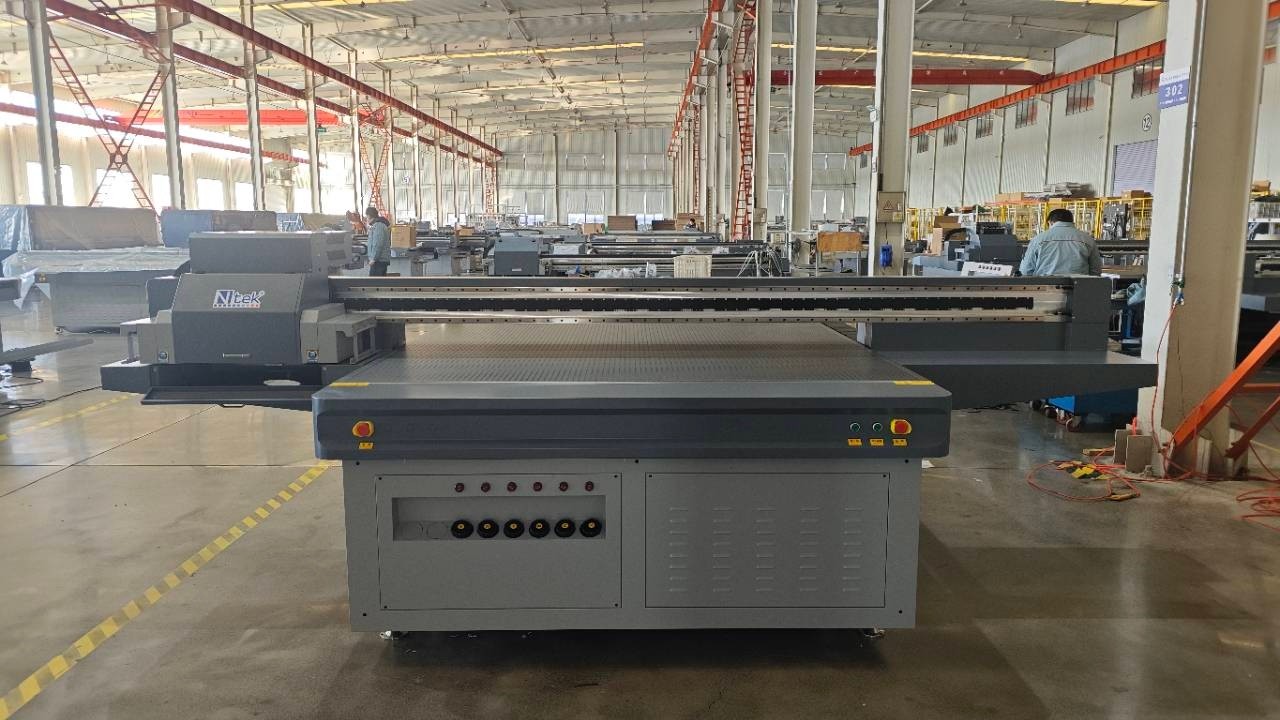 NTEK YC2030L*RICOH GEN6 UV Flatbed printer finish installation in UAE