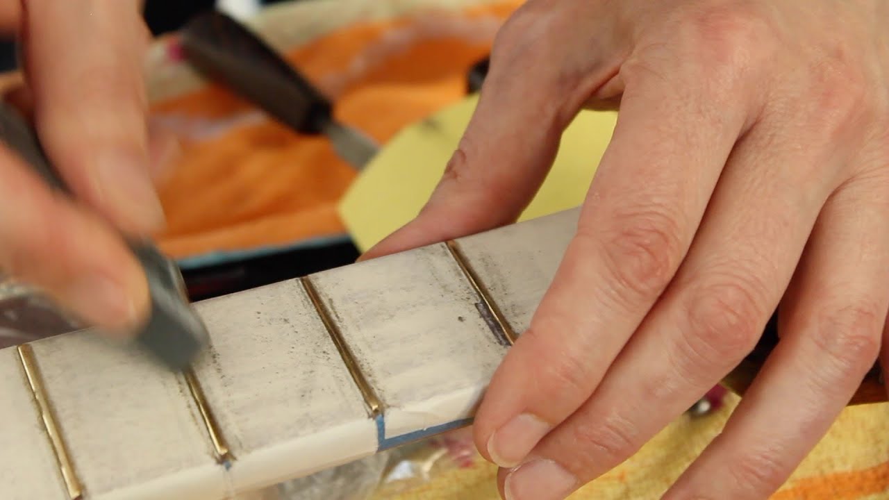 Restoring an antique parlour guitar part 38: Fret leveling crowning and polishing