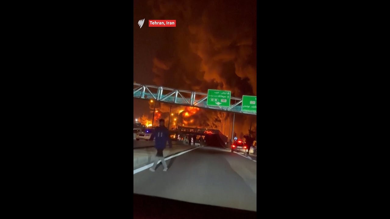 Smoke blankets Tehran after Israel strikes Iranian oil depot