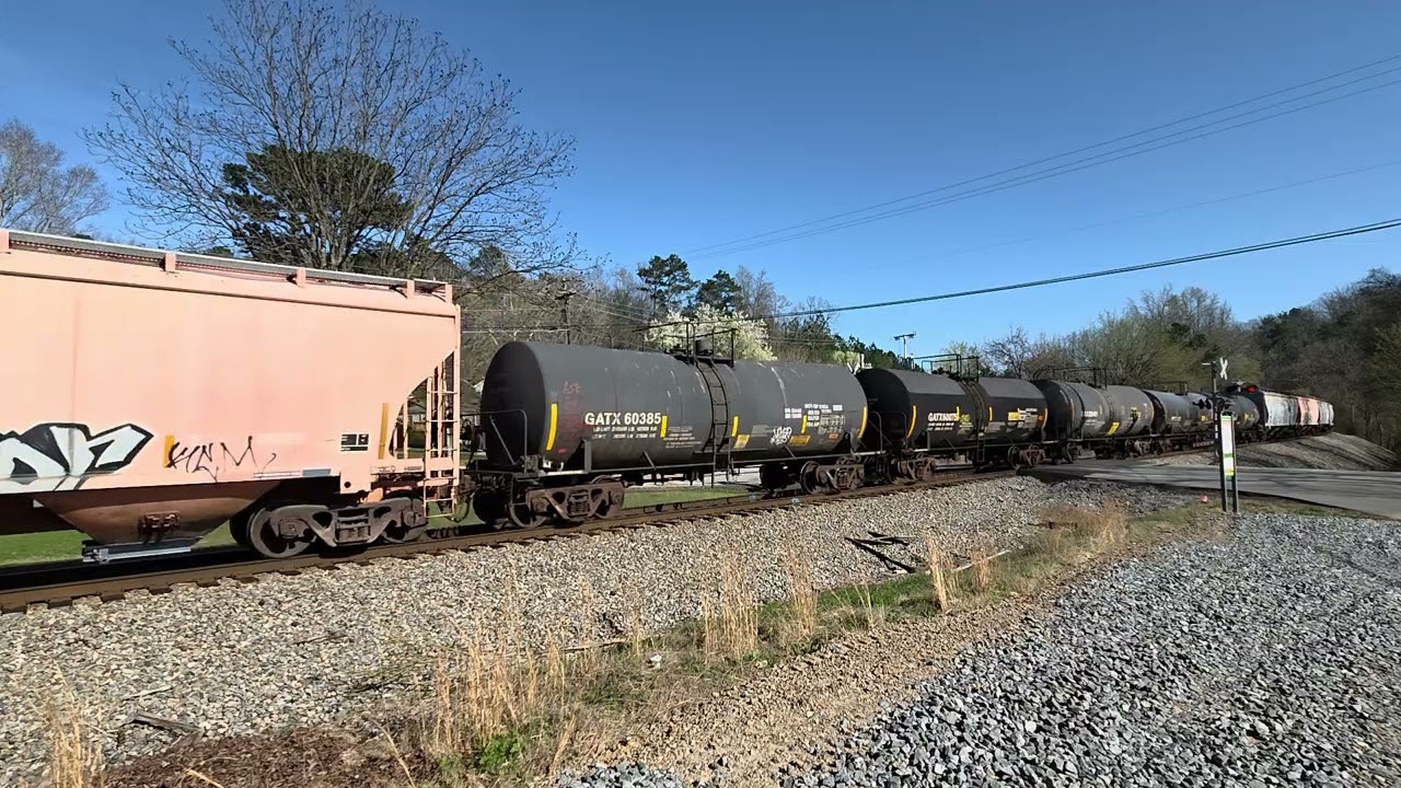 NS 4401 leads the northbound manifest at Bill Jones Rd...4186 is the mid DPU 