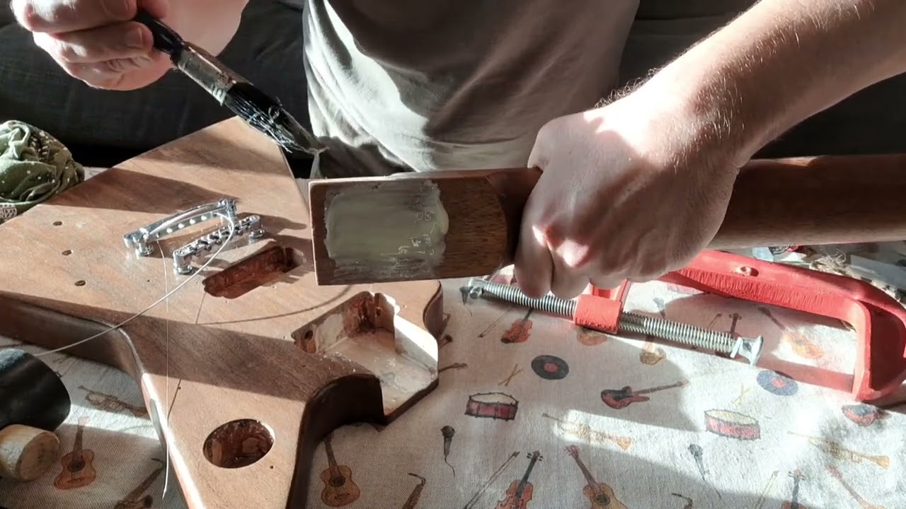 How to glue the neck onto the guitar body. Building the Coban Explorer guitar kit.