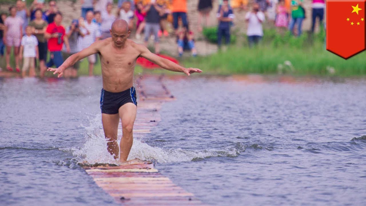 Watch this Chinese Shaolin monk &lsquo;run on water&rsquo; for an incredible 125 meters