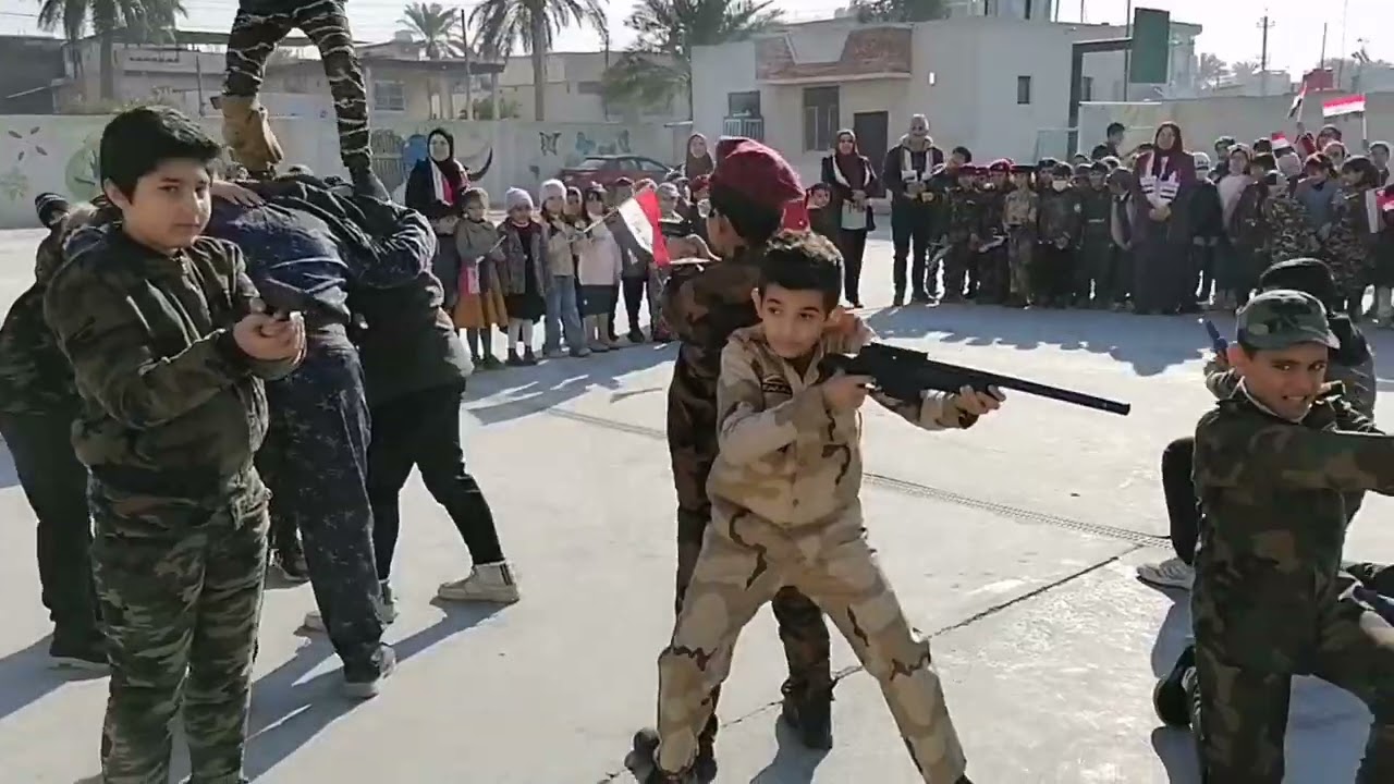 فعالية تحرير العراق في مدرسة العدل الابتدائية إعداد الأستاذ خالد العامري