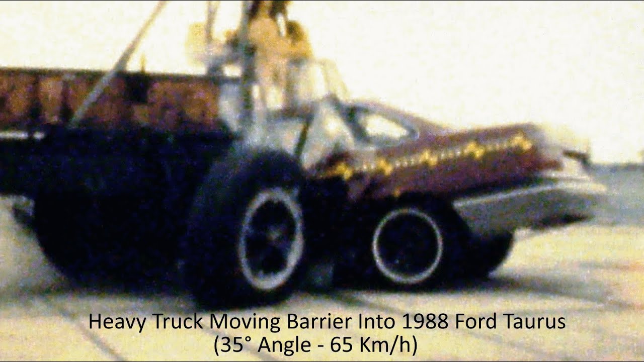 Heavy Truck Moving Barrier Into 1988 Ford Taurus Frontal Crash Test (35° Angle - 65 Km/h)