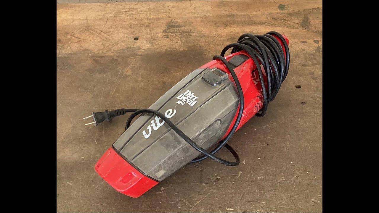 Scrapping a small handheld vacuum cleaner for copper, tin, and other metals.