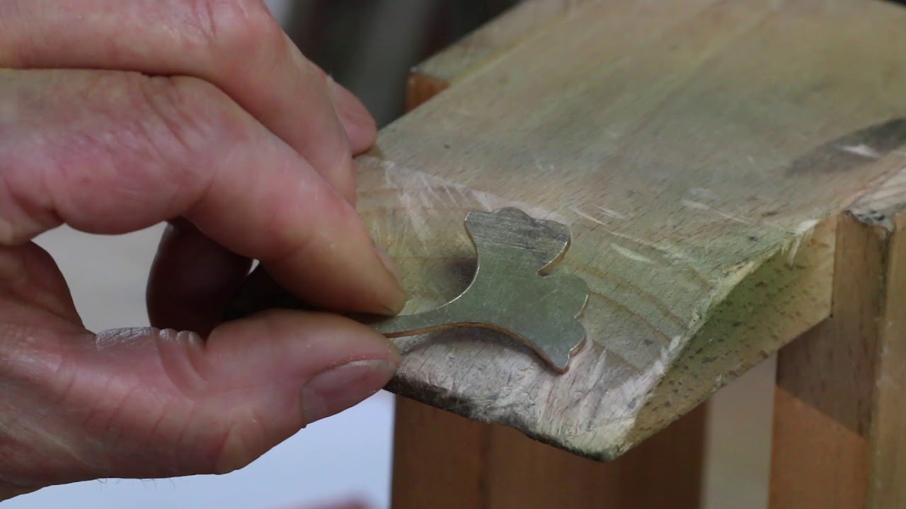 Using a half-round hand file