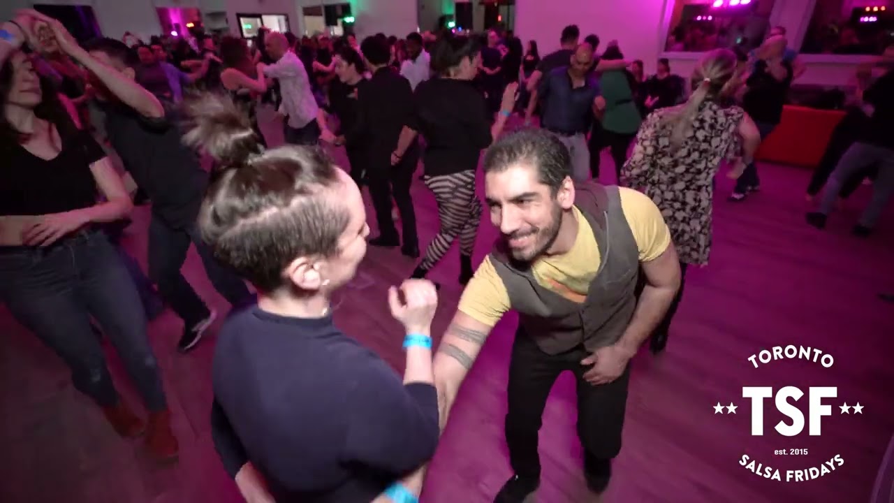 Social dancing at Toronto Salsa Fridays