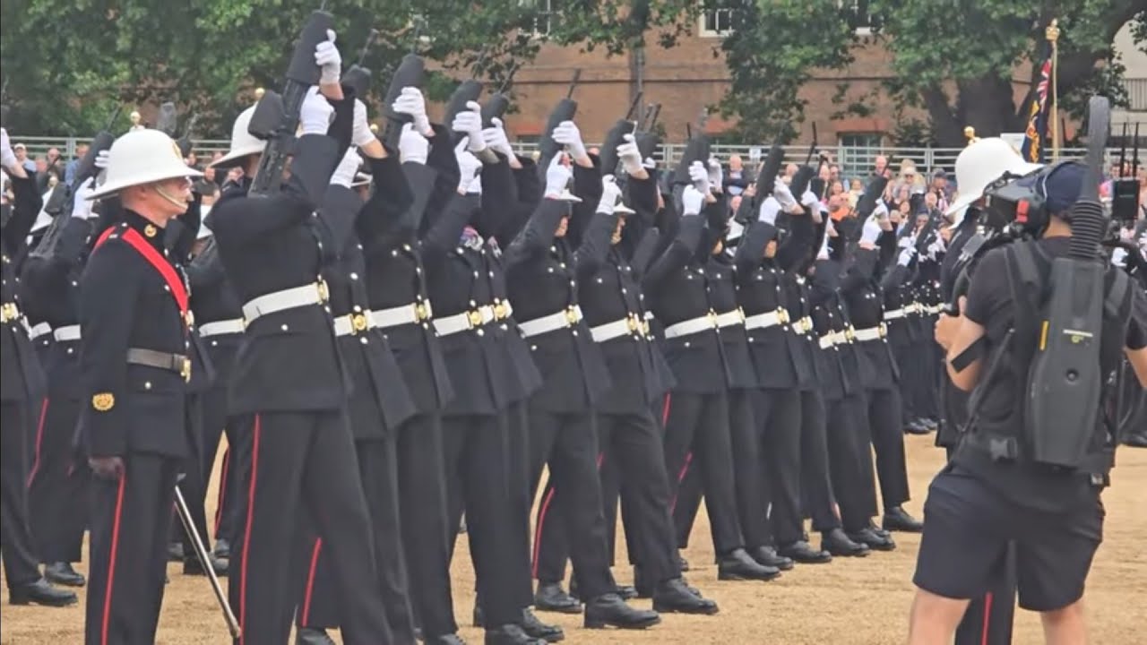 Royal Marine gun salute Marine sings, let it be what a beautiful voice she has #thekingsguard