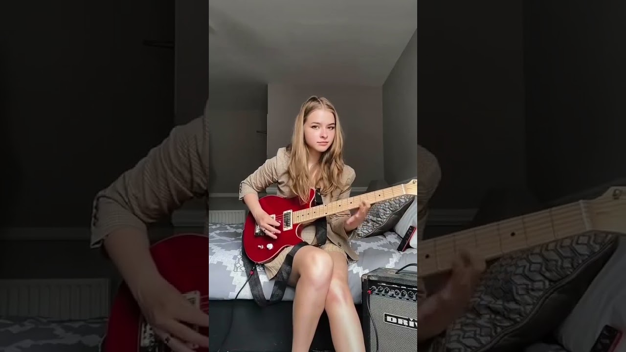 beautiful girl playing guitar cover ac/dc Thunderstruck