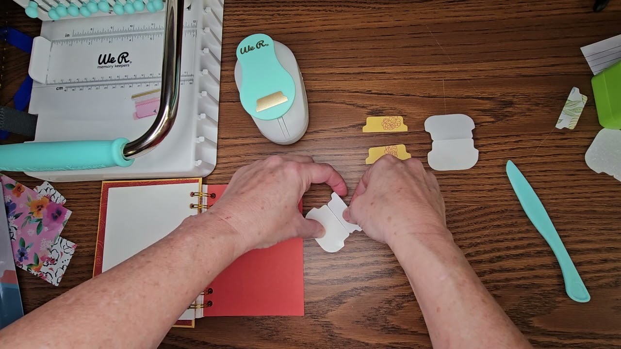 Cinch notebook tabs using WRMK tab punch.