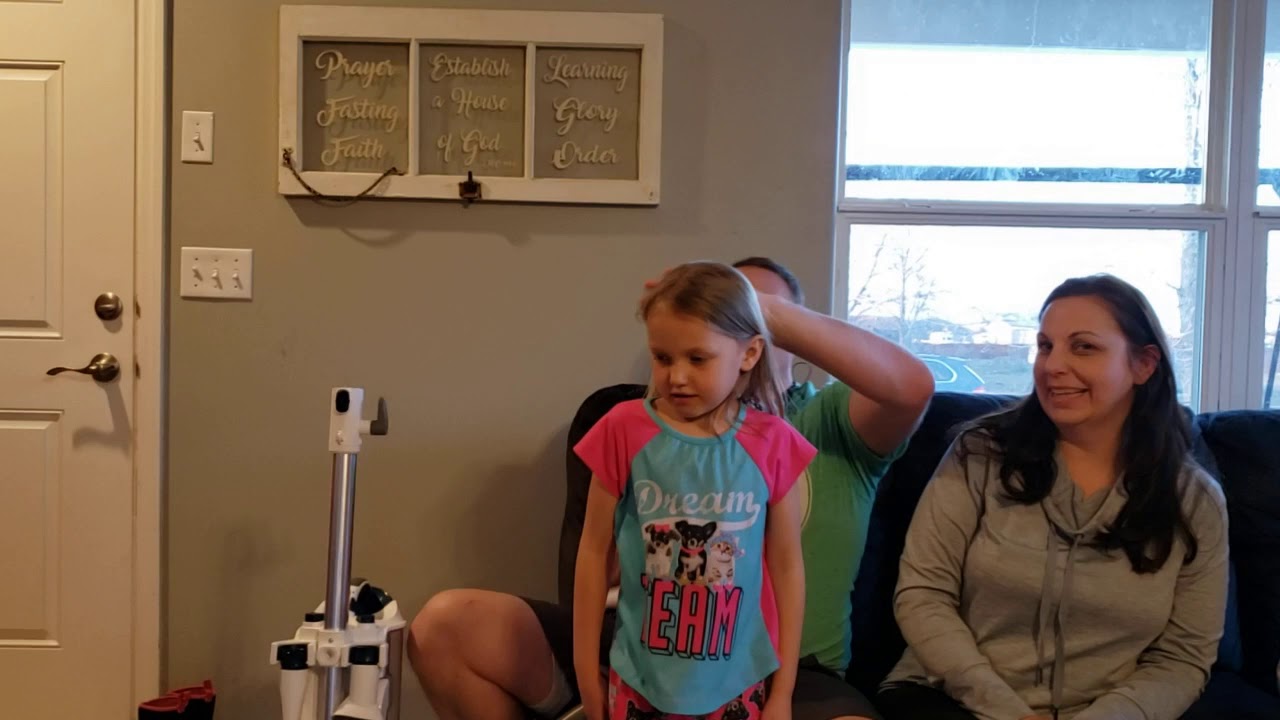 Episode 3 - 5 ponytails in 1 minute.  Dad does hair.