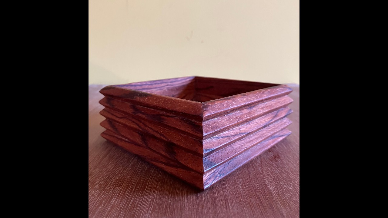 Making a comely oriental mystery box out of african ebiara